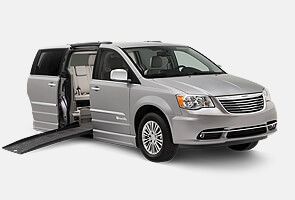 Chrysler van with companion van plus BraunAbility conversion
